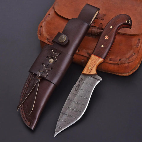 Custom Handmade Damascus Fixed Blade Knife 10 Inch With Rosewood And Olive Wood Handle on black surface with leather sheath