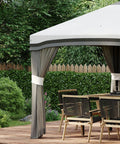 10x10 Pop Up Canopy Tent With Netting For Outdoor Parties Instant Setup Easy Setup Gazebo installed in garden yard, gray color.
