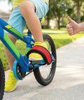 Child on a blue bike using Kids Bicycle Toe Clip Straps Set For Easy Install Pedal Footrest Durable Nylon Construction Kid Friendly Adjustable Fit Bike Pedal Accessory For Shoes And Slippers Perfect Foot Security And Comfort On Small Bikes