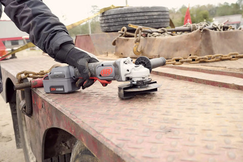20V Cordless Angle Grinder and Cutoff Tool with 8000 RPM 1 HP 4.5 Inch Wheel on a metal surface for fast material removal