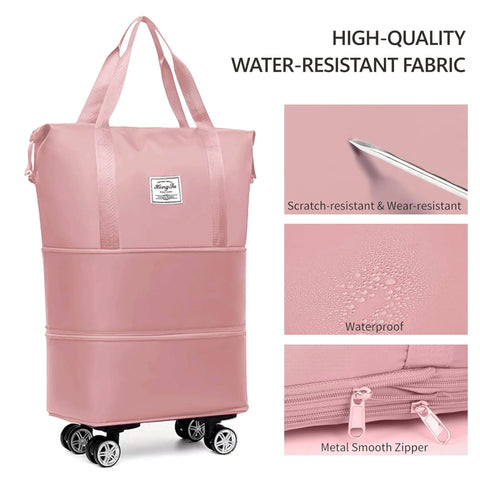 Front view of pink expandable foldable duffel bag with top handles and rolling wheels; water-resistant fabric