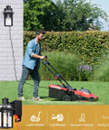 Man using lawn mower near porch light with GFCI outlet and dusk to dawn sensor outdoor exterior light fixture on a wall.