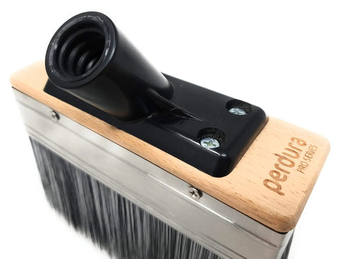 Close-up of the Deck Boss Mini 6 Inch Deck Stain Brush Applicator showcasing the handle fitting and wood base with branding.