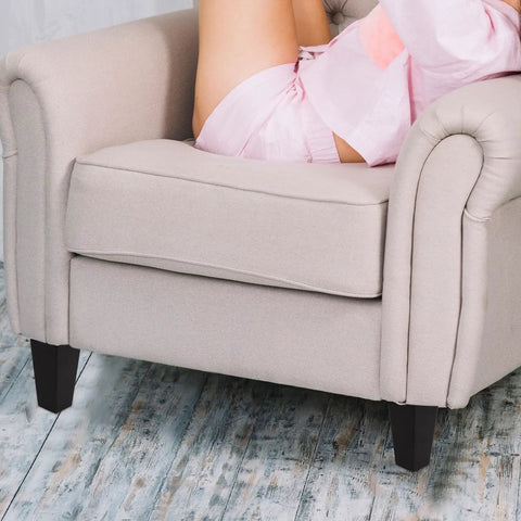 4 Pcs Wood Furniture Legs Replacement For Sofa, Black Minimalist Style, attached to a beige armchair on wooden floor
