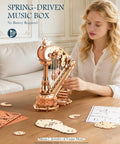 3D Wooden Puzzle Harp Music Box With Mechanical Movement Building Kit in wood, shown on table during assembly