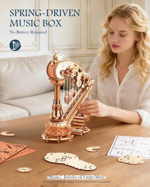 3D Wooden Puzzle Harp Music Box With Mechanical Movement Building Kit in wood, shown on table during assembly