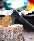 4 Piece Jute Flame Starters Quick Ignition Reusable Outdoor Fire Starters displayed on a tree stump with an axe nearby.