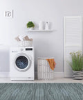 Slate wood grain interlocking foam floor tiles 3/8 inch thick in laundry room, 24 sq ft coverage, perfect for home gym and office use.