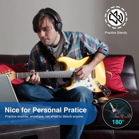 Man using Silent Practice Headphone Amp for Electric Guitar and Bass with Rechargeable Battery, 5 Effects for quiet practice.