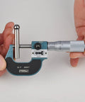 Person holding Premium Digit Outside Micrometer 0 To 1 Inch, 0.0001 Inch Readings, 0.256 Inch Flat Anvil Spindle for accurate measurements