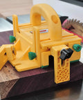 GRR-Ripper 3D Pushblock System for Safety, Precision and Control with 3-Dimensional Force on table saw with wood piece