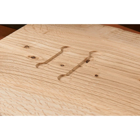 Wood surface showcasing precise inset cuts made with Rock Solid Dual Stitch Router Inlay Clear Block Thick Acrylic Jig Made For Plunge Routers Using 1/8 Bit Sizes To Nail Precision Woodworking Layouts And Fit Tight.