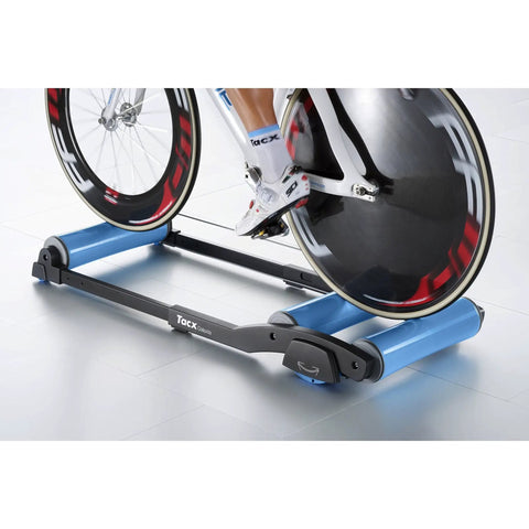 Indoor Bicycle Rollers With Foldable Retractable Design For At Home Gym Training, Conical Centering Rollers And Swing System in use