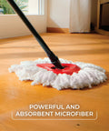 Heavy Hitter Microfiber Spin Mop And Bucket Set Including Three Extra Washable Replacement Pads For Fast Dirt Trapping And No Sweat Floor Mopping Quick Dry Finish On Hardwood on wooden floor.