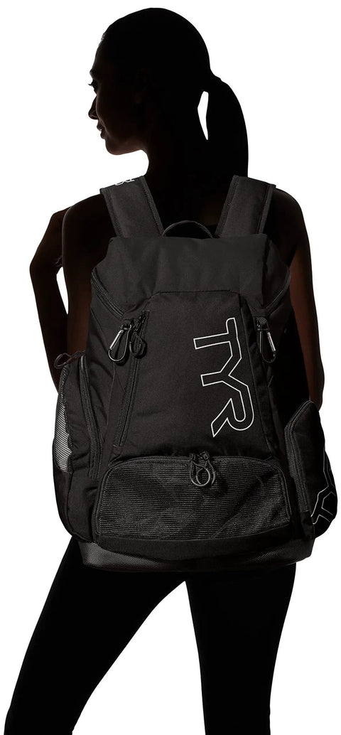 All In One Wet Dry Gym And Pool Backpack With 45L Capacity on woman, black color, visible front pockets, silhouette view