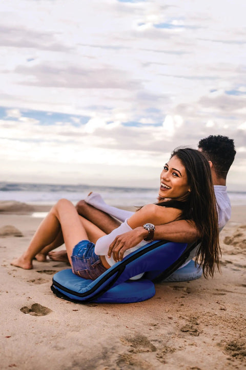 Couple sitting on Go Anywhere Camping Chair With Padded Seat And Backrest Adjustable And Ultra Portable Lightweight Blue Alloy