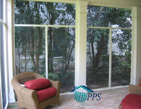 Heavy Duty 9 X 100 Foot Charcoal Fiberglass Mesh Screen With 20x20 No See Um Build used in a screened-in lanai with comfy red cushions.