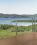 This 12 Foot Cable Railing Kit Brings Serious Style To Any Deck Or Patio Featuring Pre Drilled Metal Posts Marine Grade Stainless Wire All Necessary Tools And Hardware In Smooth Grey With A No Fuss Face Mount Assembly overlooking a scenic lake.