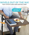 Wonder Tray Plus Adjustable Recliner Swivel TV Tray With Easy Grip Standing Handle For Seniors And Older Folks Walnut Laptop Desk For Couches And Chairs Mobility Sit And Stand Assist showing a side table swivel feature.