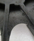 Close-up of 37FN3002A01SP EXFN plastic bearing sleeve with visible part number, showcasing precision fit design detail.