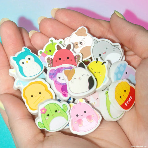Hands holding 25 Piece Mini Eraser Set With Cute Cartoon Characters Like Banana Cactus Frog And More Awesome For School Supplies