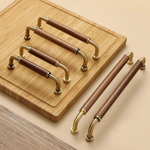 4 Pack 3.8 Inch Gold Walnut Wood Brass Drawer Pull Handles For Dresser Cabinet Wardrobe displayed on a wooden board