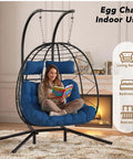 Two Seater Wicker Hanging Egg Chair With Stand 700 Lb Capacity Indoor Outdoor Double Swing Hammock Dark Blue in living room