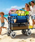 Heavy Duty Double Decker Beach Wagon Cart With 500Lb Load Capacity, 400L Dual Level Storage, Balloon Wheels For Sand, Folding Collapsible Wagon With Side Pocket, Ideal For Beach Trips, Camping, Outdoor Sports, Blue loaded with gear on a sandy beach.