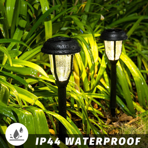 Eight Pack Solar Pathway Lights Waterproof Outdoor Garden Yard Landscape Walkway Driveway With Auto On Off And Energy Saving Warm White Glow Weather Resistant Easy Setup in garden
