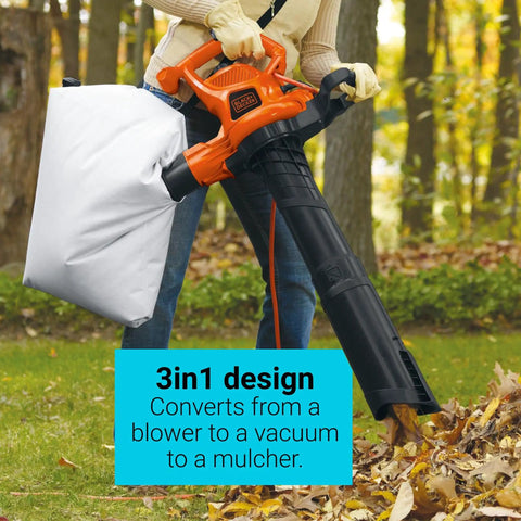 Person using 3 In 1 Corded Leaf Blower Vacuum Mulcher With 230 MPH Airflow And 12 Amp Motor in vacuum mode outdoors