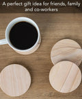Desert Sandstone Coasters Set with coffee mug, showcasing all natural multicolor stone with unique grain patterns on wooden table.