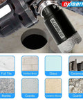 Tile hole saw bit installed on a drill; dry diamond core, 1-3/8 in (35 mm), DKIBBIT, 5/8-11 thread, 3/8 in hex shank
