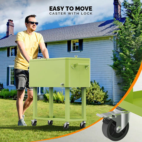 Person pushing 80 Quart Rolling Ice Chest Cooler Cart For Patio Parties And Party Ready Backyard Bar Setup With Folding Shelf And Bottle Opener Light Green Portable Beverage Cooler On Wheels in garden.