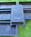 12 Piece Design Concrete Molds For Paving Bricks Slabs And Patio Pathways Do It Yourself Garden Walkways on green grass