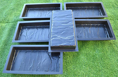 12 Piece Design Concrete Molds For Paving Bricks Slabs And Patio Pathways Do It Yourself Garden Walkways on green grass