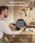 Man adjusting Powerful 1500W Space Heater With 60 Degree Adjustable Tilt, Remote Control, Quiet Portable Electric Heater in workshop.