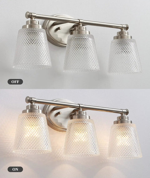 Above view of Three Light Bathroom Vanity Light Fixtures Over Mirror in Brushed Nickel Finish with Crystal Glass Shades, on and off.