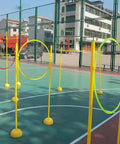 Drone Racing Practice Kit For Home Use Build Skills In Model Aircraft Racing With A Portable Obstacle Course Set shown on a court