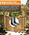 Rugged Heavy Duty Gate Hinges Delivering A Rock Solid 270 Degree Full Pivot Swing For Wood Fence And Barn Doors in a garden setting.