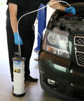 Slick Manual Fluid Evacuator Pump For Muscle Cars And Street Rods With No Hassle Oil Drain and Brake Fluid Extractor in use.