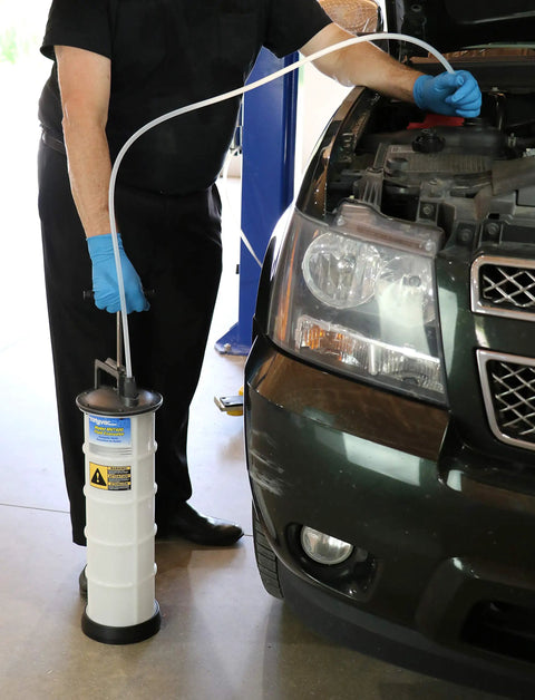 Slick Manual Fluid Evacuator Pump For Muscle Cars And Street Rods With No Hassle Oil Drain and Brake Fluid Extractor in use.