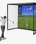 Golfer using Range Cage Elite Golf Hitting Net 8 x 8 Ft Pro Grade Simulator Enclosure with side netting and HD impact screen