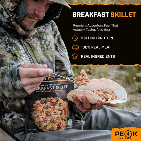 Camper holding Breakfast Skillet Freeze Dried Camping And Backpacking Meal With Eggs Sausage Potatoes And Peppers High Protein 2 Servings
