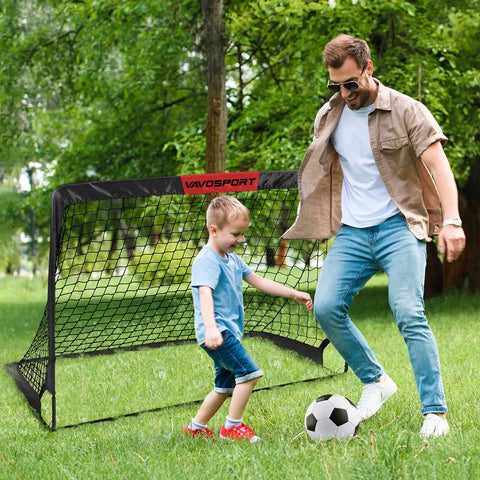 Two 4x3 Ft Portable Pop Up Soccer Goals Backyard Training Set With Ball Pump Cones Ground Nails And Carry Bag For Kid Friendly Outdoor Play And Youth Soccer Practice Kit shown in a backyard with a child playing soccer.