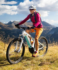Cyclist on mountain trail with Two Pack 26 Inch Inner Tubes With Schrader Valve For 26 Inch Tires From 1.75 To 2.125 Road And Mountain Bike Compatible Fits 47 559 To 57 559 Includes Tire Levers in use