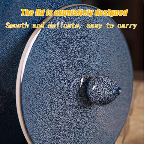 Close-up of the lid of the solid ceramic rice container with a tight seal, showcasing its blue texture and smooth design.