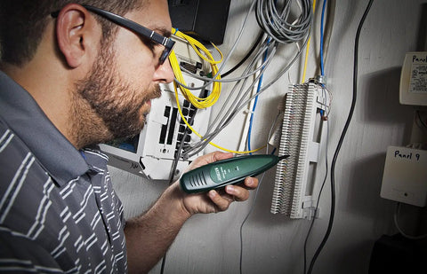 Electrician using Wire Tracer Kit With Tone Generator For Cable Locator, Non Contact Probe in telecom setup