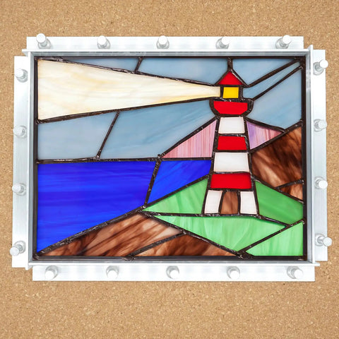 Professional Stained Glass Layout Block System With 80 Push Pins To Keep Your Panels Dead Square and feature a lighthouse design.