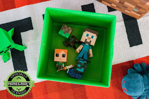 Creeper Themed Storage Cube Organizer For Kids Room 10 Inch Square Bin with Minecraft toys inside, on colorful rug