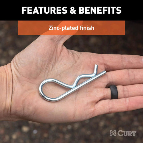 Trailer Hitch Clips For One Half Inch Or Five Eighths Inch Pins Three Pack Clear Zinc Finish Durable Steel Construction Secures Hitch Pins To Trailers Fits Pins With Hole Or Grooved Attachments Easy To Use displayed in a hand